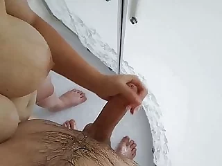 sexy mummy with big tits jerks off a trouser snake in the shower