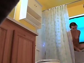 Stepsister shaves her pussy in the shower