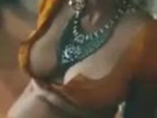 Desi MILF with massive tits takes beyond a meaty Indian cock