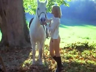 Brigitte Lahaie rides a horse to get to the sex place faster